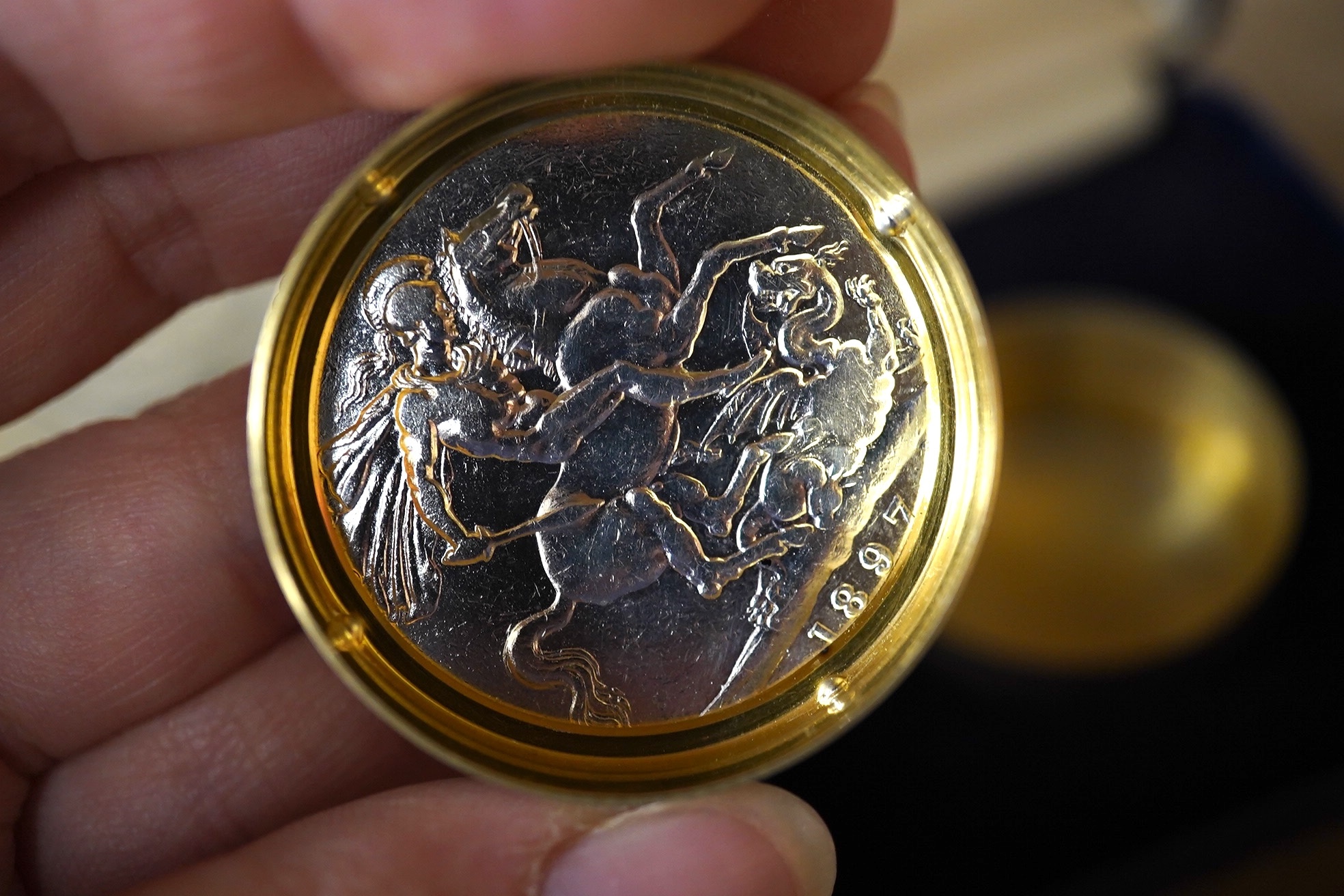 A modern enamelled silver crown coin inset circular pill box, by C.S. Green & Co and an 1863 agricultural prize medallion. Condition - fair.